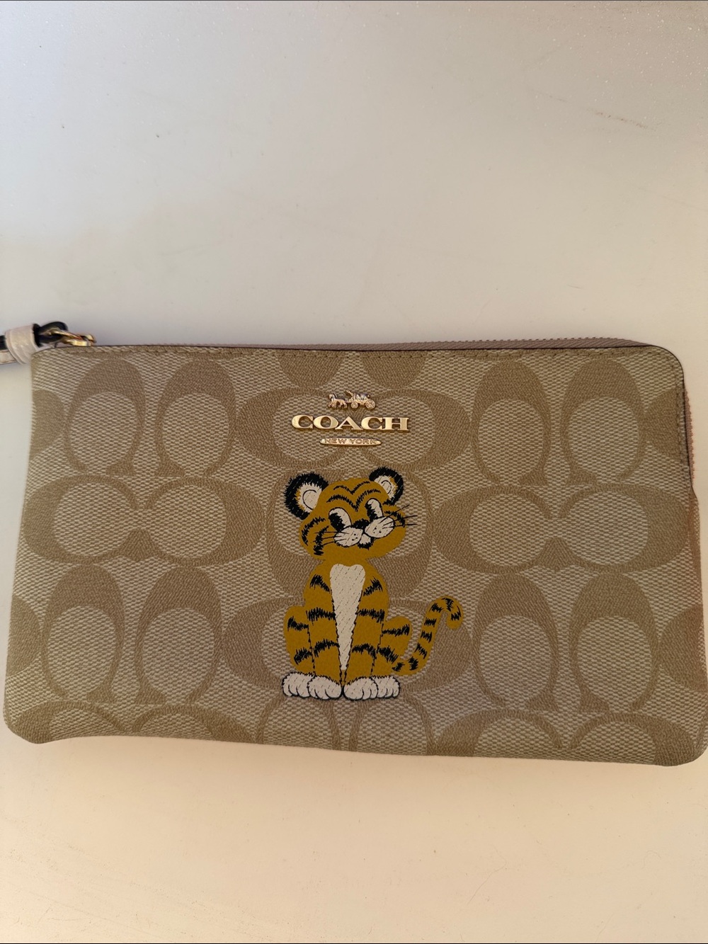 Coach Tan Signature Canvas Wristlet with Yellow Tiger Motif